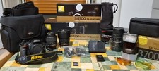 Macchina fotografica digitale reflex Nikon D5100 + 3 obiettivi + flash + borsa