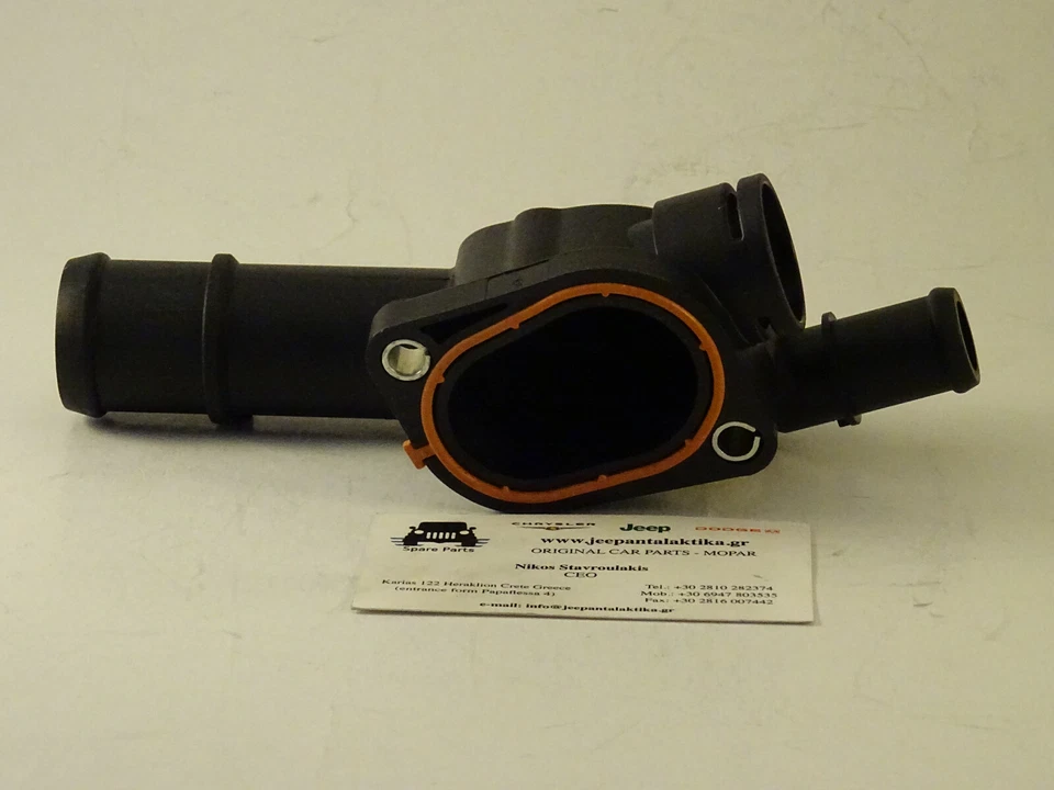 Carcasa de salida de agua Jeep Compass / Patriot MK 07-09 68001300AA nueva generación Mopar Foto 4 de 4