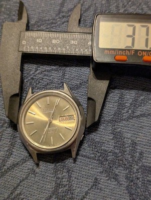 Citizen Cosmotron Electronic Watch Men 38mm Champagne Dial Steel Daydate New Bat