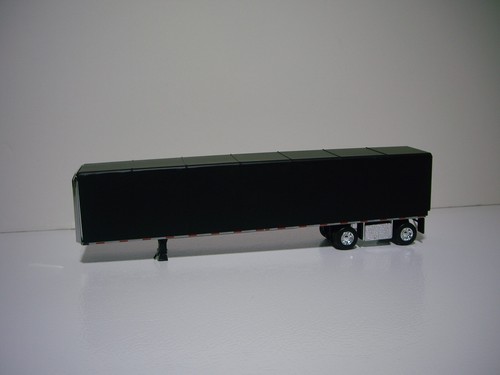 DCP FIRST GEAR 1/64 TEAL PETE 579 WITH SLEEPER AND SIMULATED ROLL TARP TRAILER - Picture 6 of 12