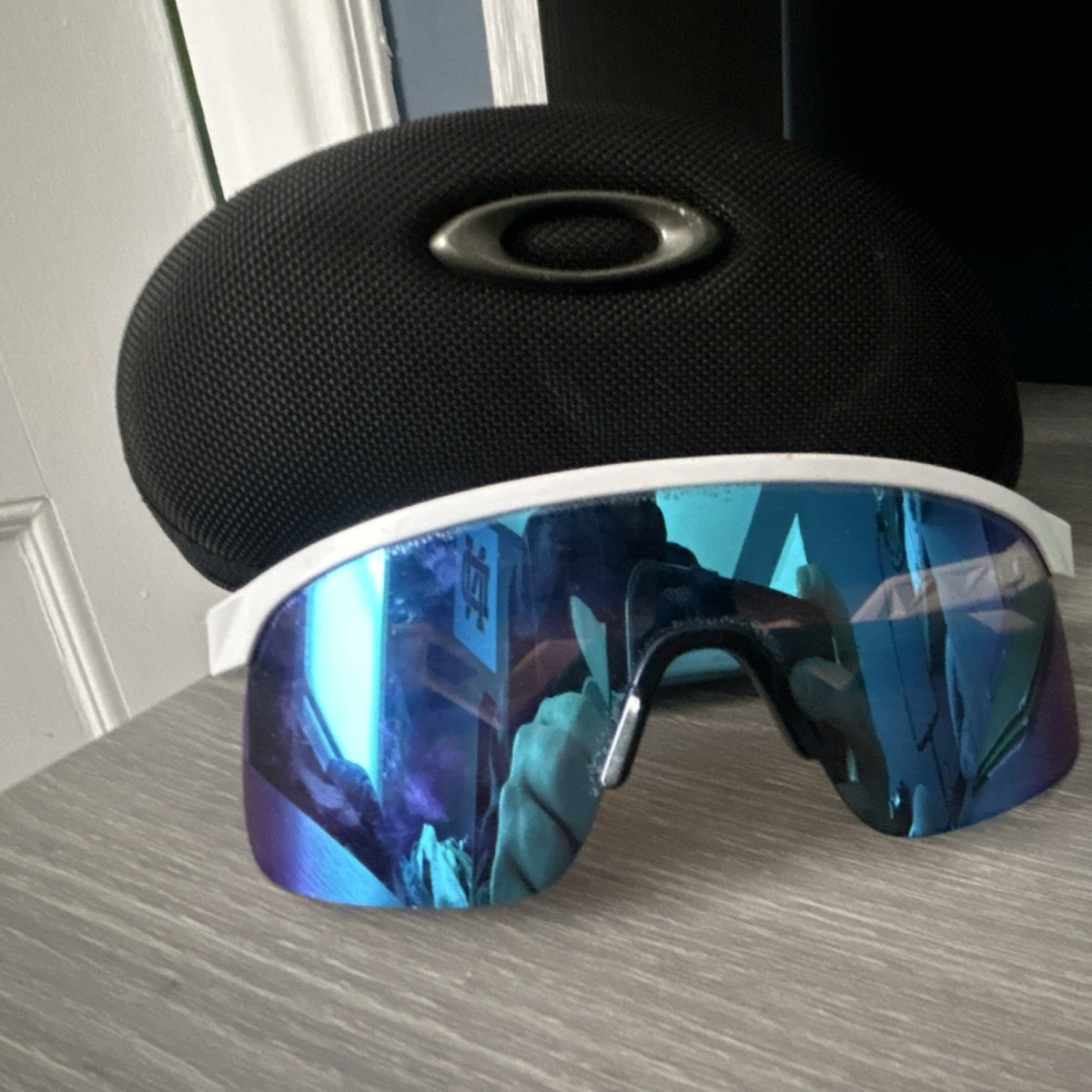 OAKLEYサングラス ホワイト/ブルー Oakley Men's Shield Sports Sunglasses White Plastic Frame Blue