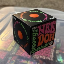 1 - New In Box Nee Doh The Groovy Glob Squeeze Ball Orange