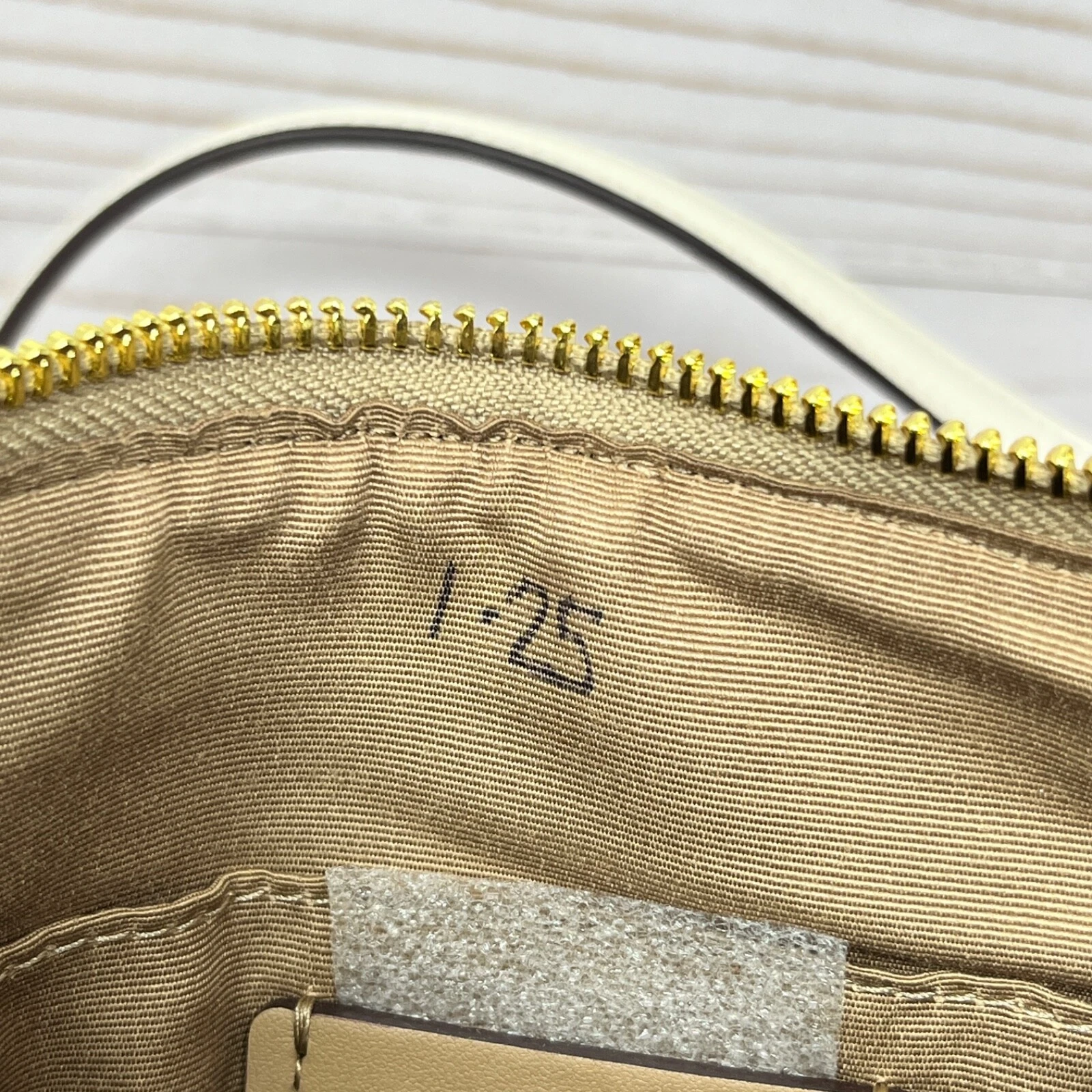 Borsa a tracolla Coach Mini Rowan File Marrone Gesso Nuova con difetto estetico