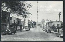 WI Kewaunee RPPC 1940's MILWAUKEE STREET SCENE Cars STORES by L.L. Cook K468