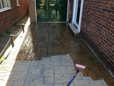 Imprinted concrete coloured driveway sealer paint charcoal grey,black, top coat