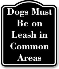 Dogs Must Be on Leash in Common Areas BLACK Aluminum Composite Sign