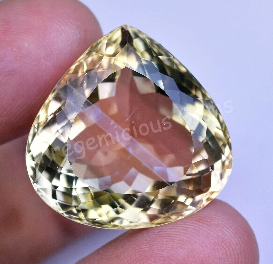 Turmalina amarilla natural impecable 45,20 quilates certificada pera llamativa piedra preciosa suelta Foto 2 de 4