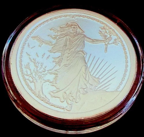 1 oz .999 Silver.  Silver Bullet Silver Shield Round