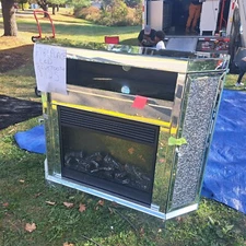 LED Bluetooth fireplace TV stand. Mirrored all around, color changing light heat