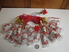 Mini botella de licor Stolichnaya Vodka cadena luces enchufable fiesta navideña NUEVO