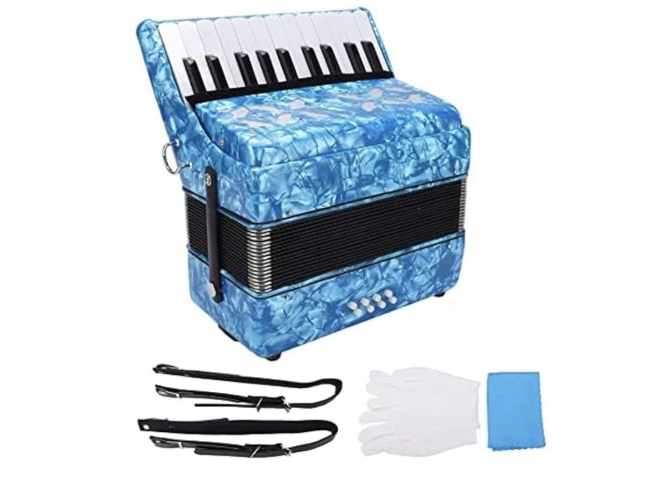 El instrumento que se muestra es un acordeón de piano IRIN de 17 teclas y 8 bajos. Foto 4 de 4