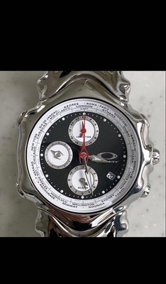 OAKLEY GMT Black Dial Silver Case White Accent Stainless Steel