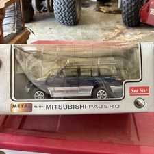 Sunstar Mitsubishi Pajero - Blue-green - 1/18 Diecast