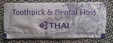 Wycieraczka i nitka dentystyczna Thai Airways, nieużywana. Oryginalne opakowanie