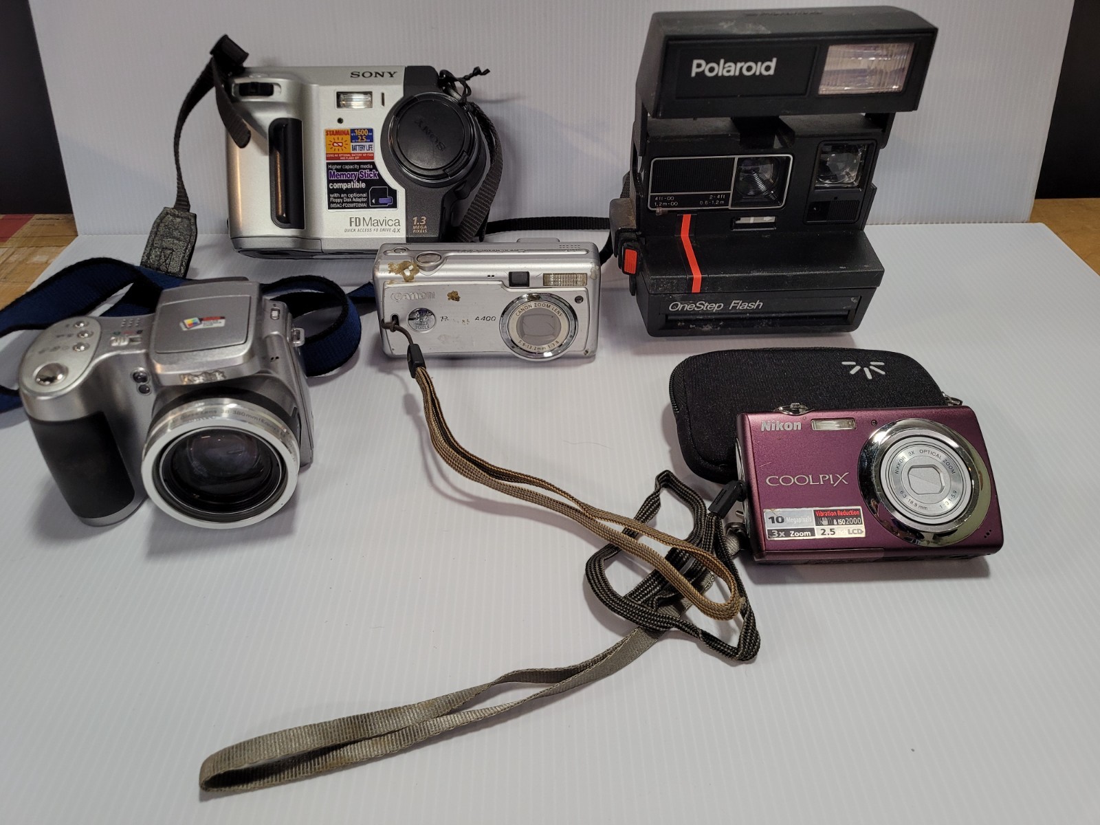 5 camera lot Canon Kodak Sony Polaroid Nikon