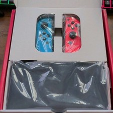 Nintendo Switch OLED 64GB Console w/ Red/Blue...