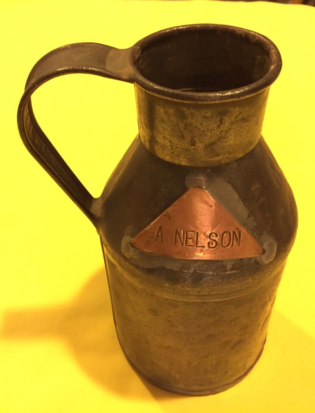 TIN CREAM CAN W/COPPER LABEL FROM A. NELSON DAIRY FARM 7 1/2” TALL W/NO STOPPER
