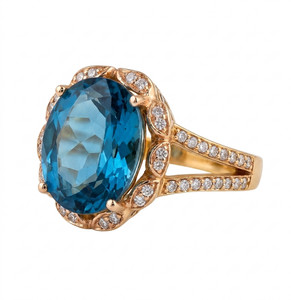 14 karat yellow gold ring, oval cut blue topaz center stone (Q7M3)