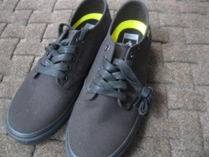 black vans with black soles