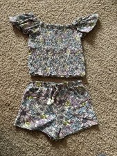 girls' floral print smocked top and shorts set.