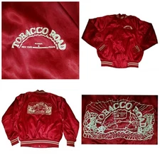 The Blue Divide: Duke, North Carolina, and the Battle on Tobacco Road jacket