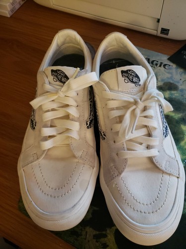 white snakeskin vans