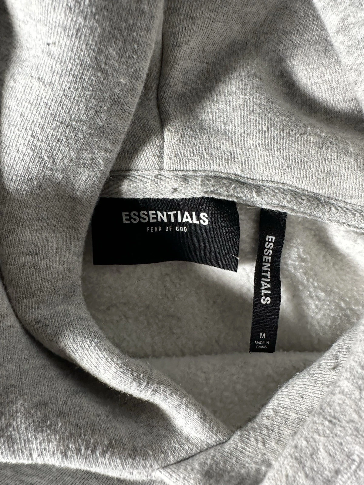 Felpa con cappuccio Fear Of God Essentials logo applicato taglia M