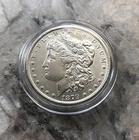 1879-O MORGAN SILVER DOLLAR IN BU MINT STATE CONDITION.