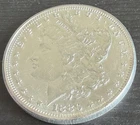 1880 Morgan Silver Dollar.   Brilliant!   Uncirculated!  Original Plastic.