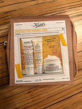 Kiehl  s travel sized bundle inc ultra facial cream, uv serum, cleanser plus bag