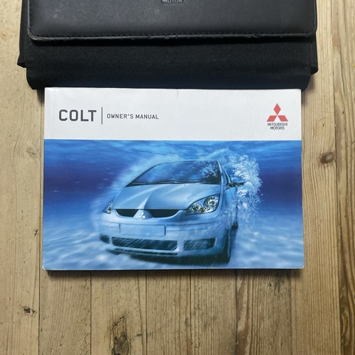 04-08 MITSUBISHI COLT OWNERS HANDBOOK MANUAL & WALLET 2006 Ref16665 DAMAGED - Picture 2 of 17