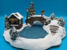 THOMAS KINKADE SKATING AT THE POND LIGHTED CH...