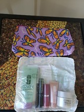 Clinique 7 Pc Gift Set Face mild soap, Plum Lipstick, mascara, eye gel Sealed