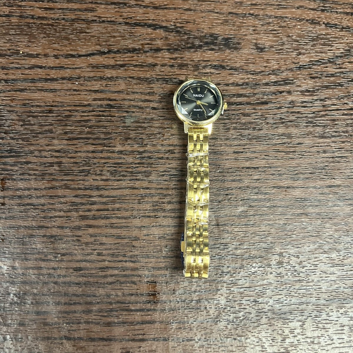 Naidu Gold Tone Quartz Watch Womens Black Dial Stainless 
