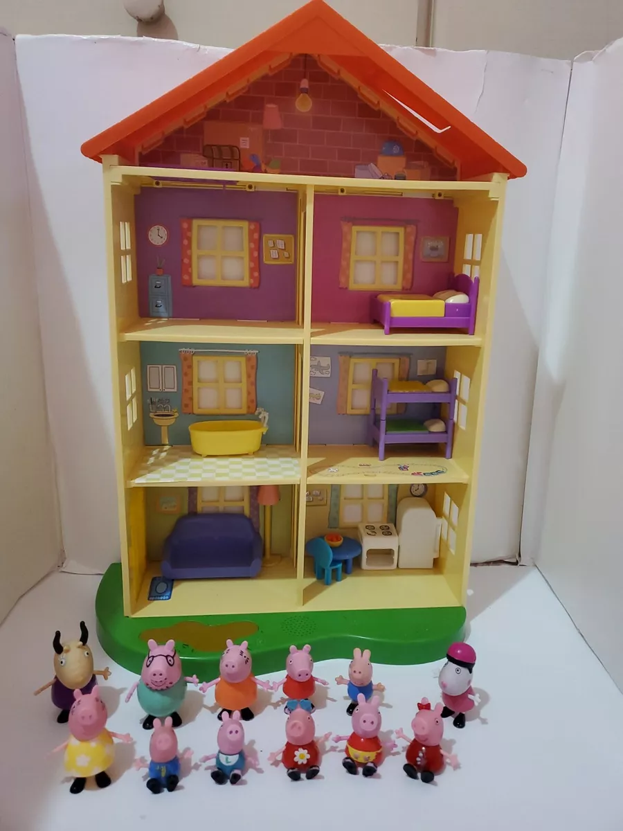 Plastic Peppa Pig toy house with different figurines Stock Photo