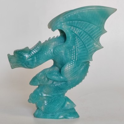 Natural quartz mineral Amazon rough stone, hand carved, flying dragon