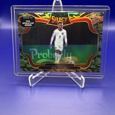 Panini Select FIFA 2025-26 Bukayo Saka Field Level Camo Prizm #245 #’d /199