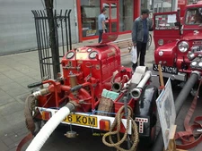 Photo 6x4 View of a 'Godiva' fire engine in Ilford Town Centre Looking so c2015