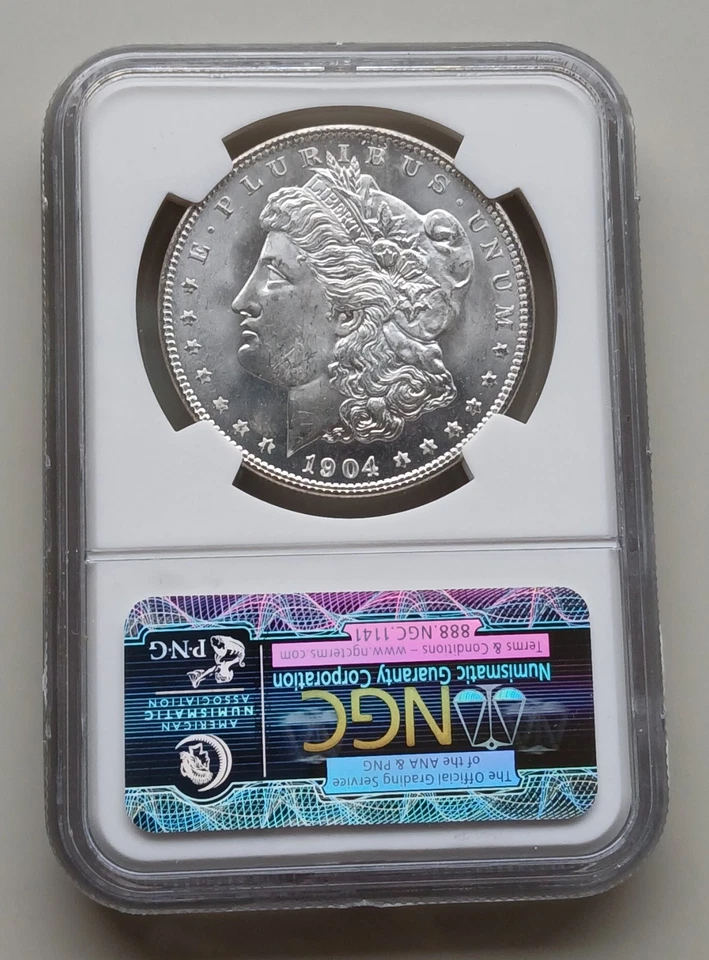 1904-O Morgan Silver Dollar REVERSE STRUCK THRU NGC MS 64 GEM - Image 2 of 3