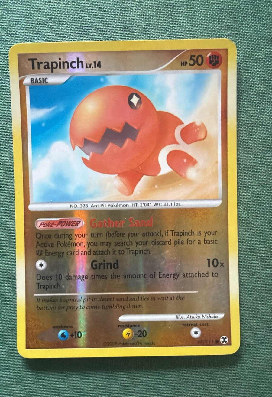 The Pokémon Company Trapinch 84/111 Rising Rivals Reverse Holo Common 50 HP EN