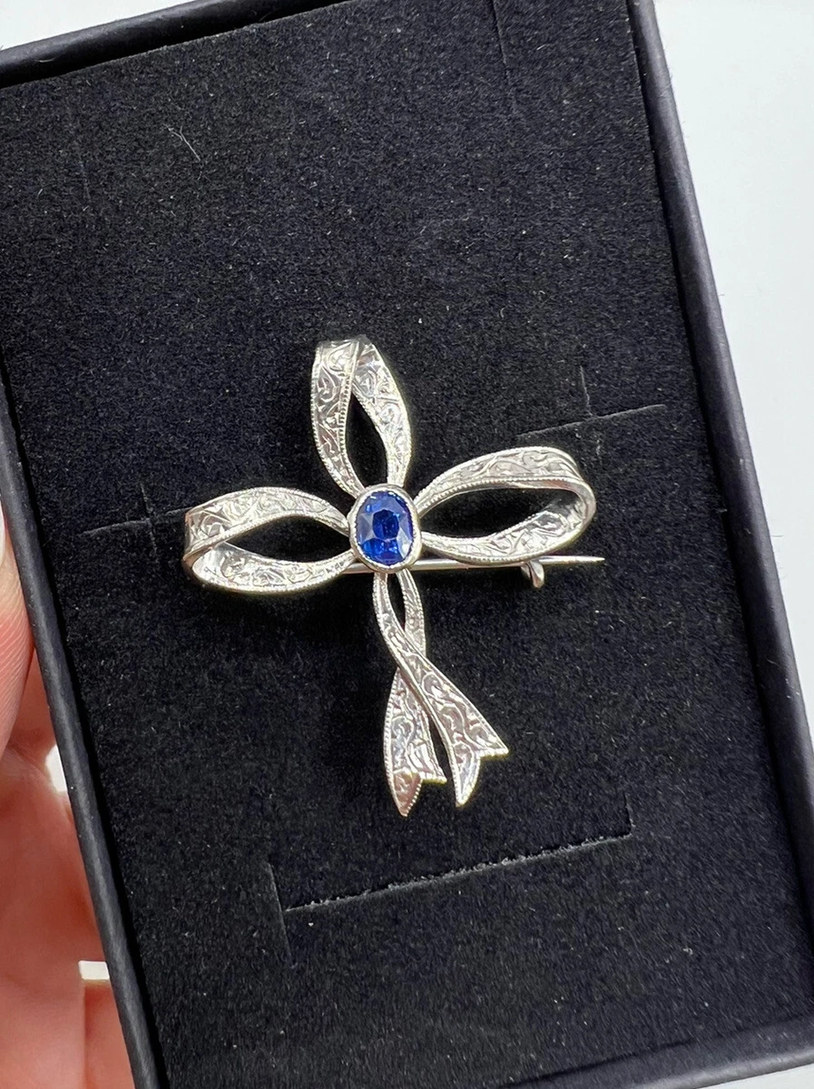 White on sale gold brooch