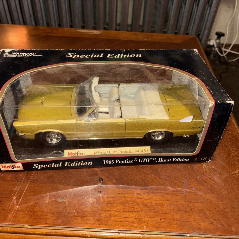 Miniature Maisto 1/18 - Pontiac GTO 1965 - Hurst Edition - Couleur Or - Occasion