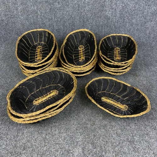 Lot of 21 9" x 6" x 2 1/4" Oval Black & Gold Rattan Baskets Restaurant