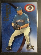 KEN CAMINITI 2001 FLEER EX ESSENTIAL CREDENTIALS NOW #/299- RANGERS