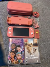 Nintendo Switch Lite Coral Bundle In Amazing Shape
