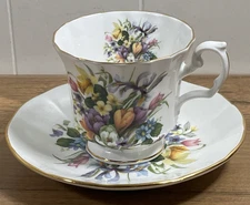 Vintage Elizabethan Flower Of The Season footed cup and Saucer made in England