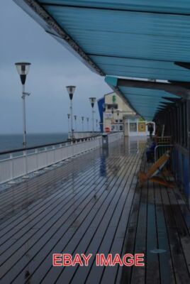 FOTO NICHT VIELE BEREIT, BOURNEMOUTH PIER IN WIND UND REGEN ZU TROTZEN 2009
