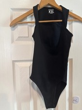 OQQ Black Ribbed Sleeveless Bodysuit Size Small