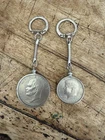1976 silver dollar and silver half dollar keychains 1 of Each