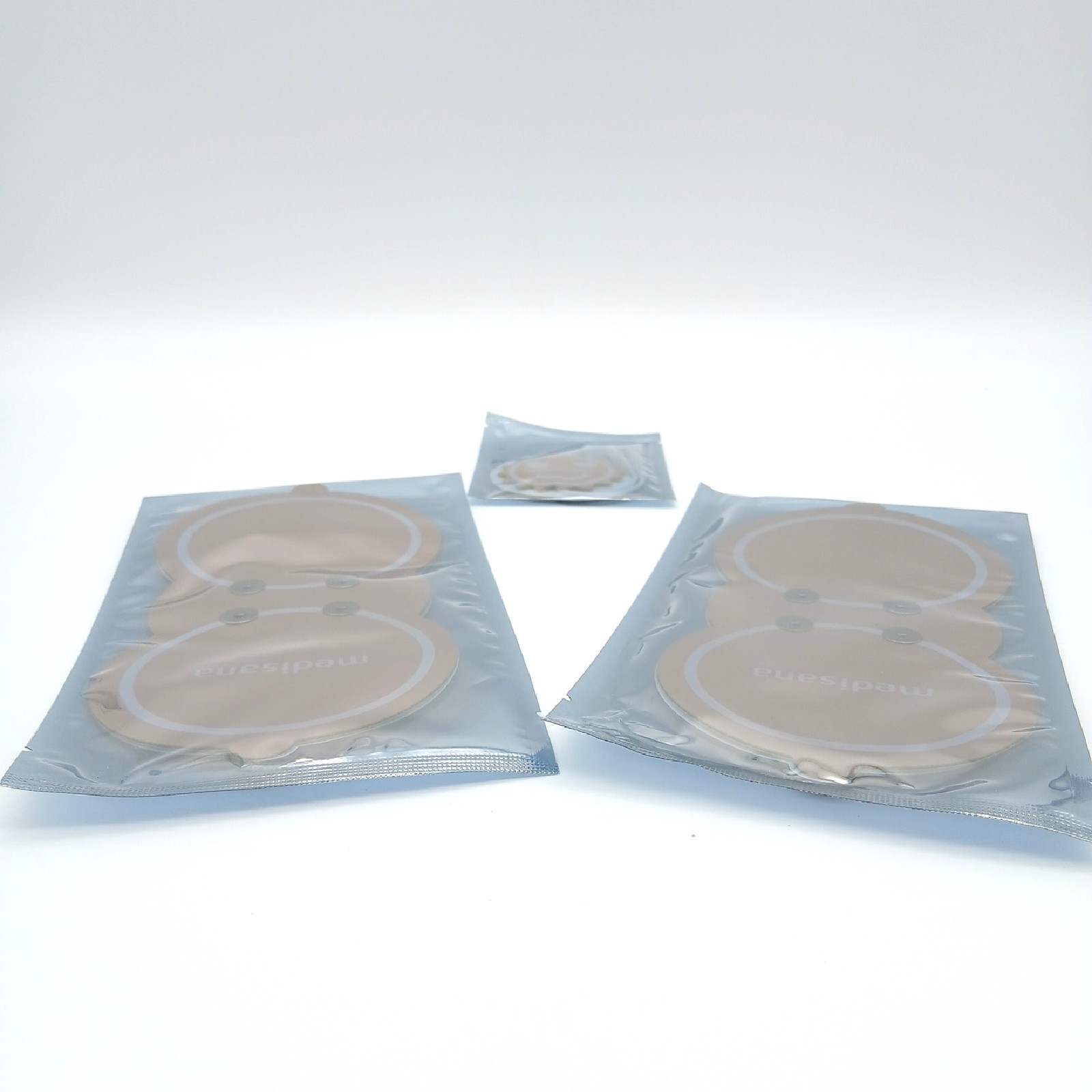 Medisana Schmerztherapiegerät TENS Menstruationsschmerz Pad TT 250 Anwendung Kom